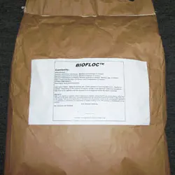 A bag of brown paper with a white label.